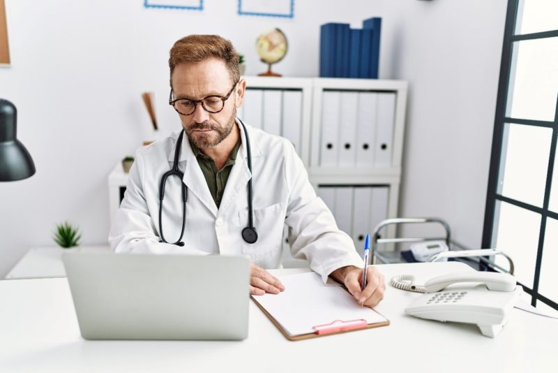 Doctor doing a Biomedical Research Paper